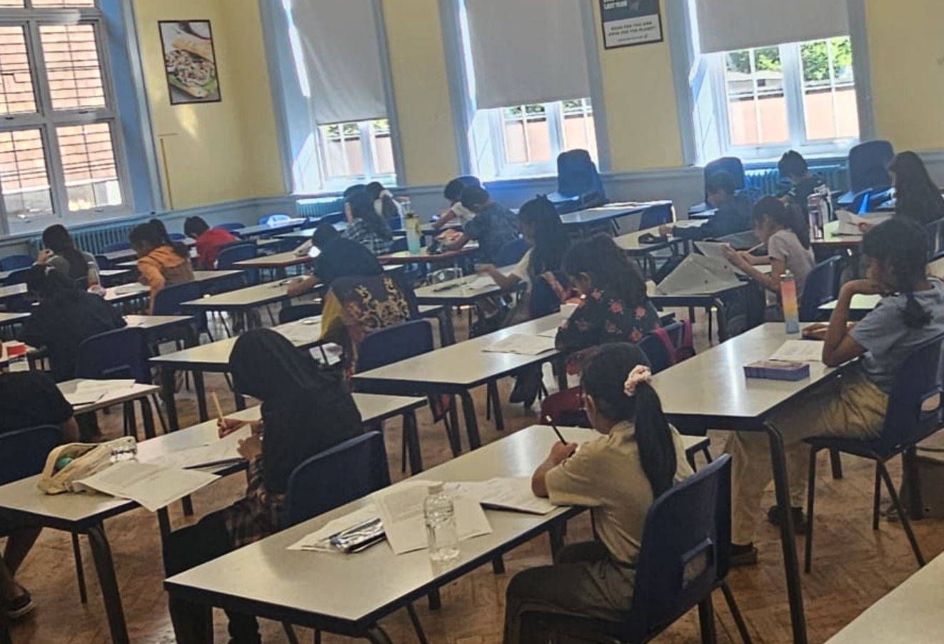 Half-room view of students at a GLECTA 11+ mock exam